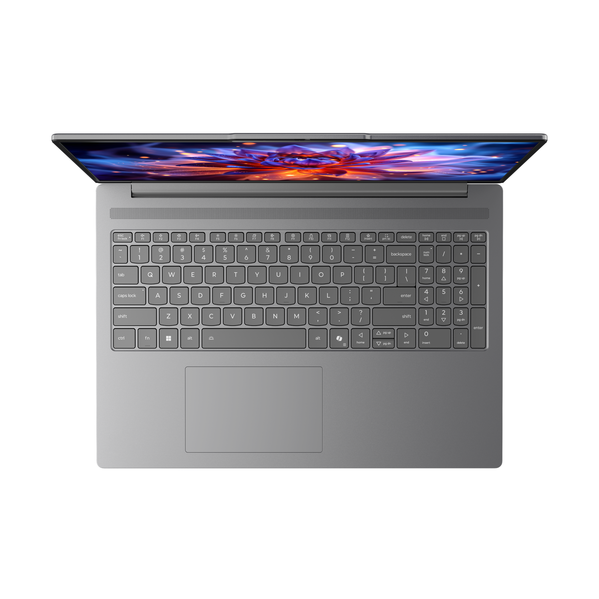 Draufsicht eines geöffneten silbernen Laptops mit buntem abstrakten Hintergrund.