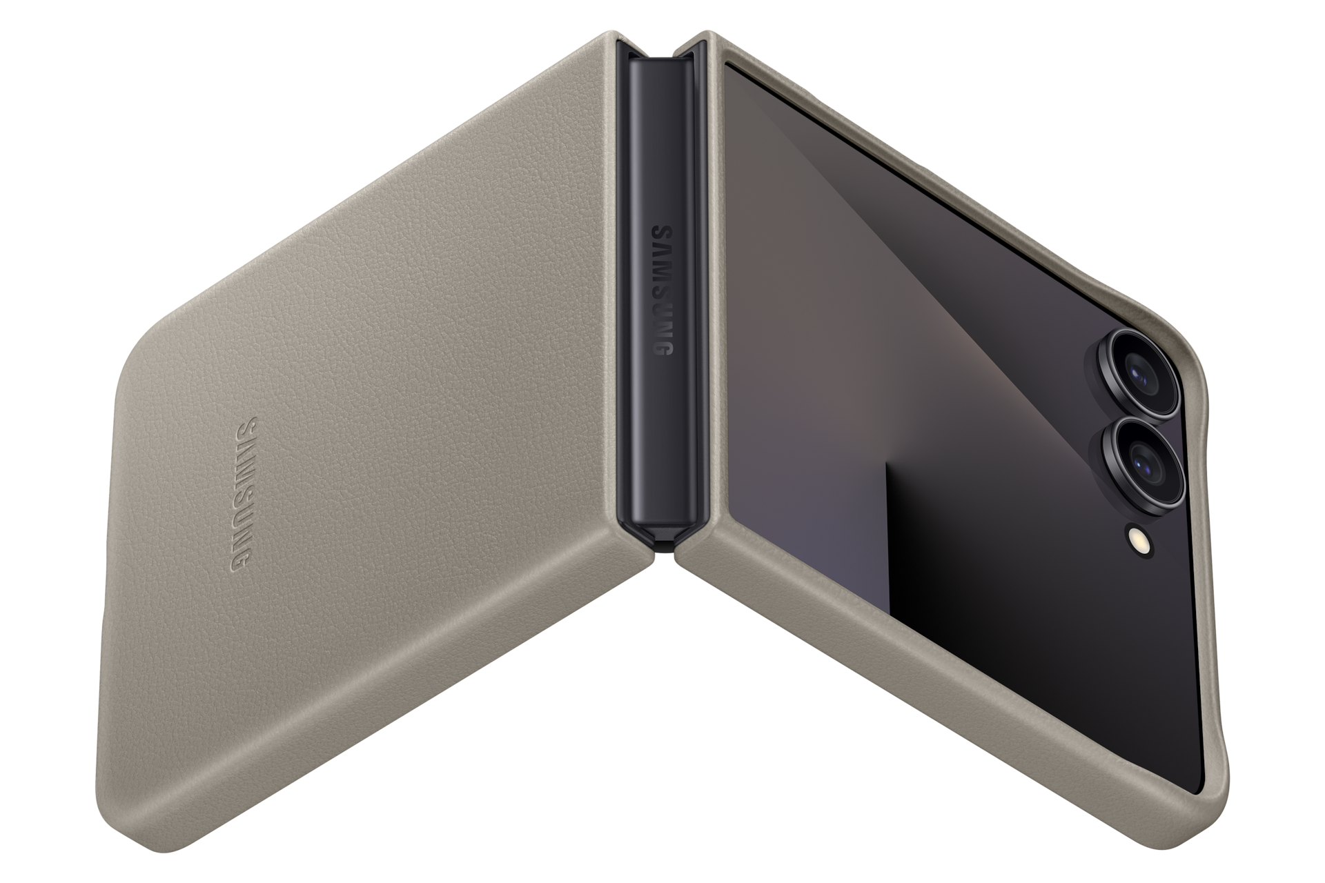 Beżowy telefon składany Samsung z dwoma aparatami, na czarnym tle.