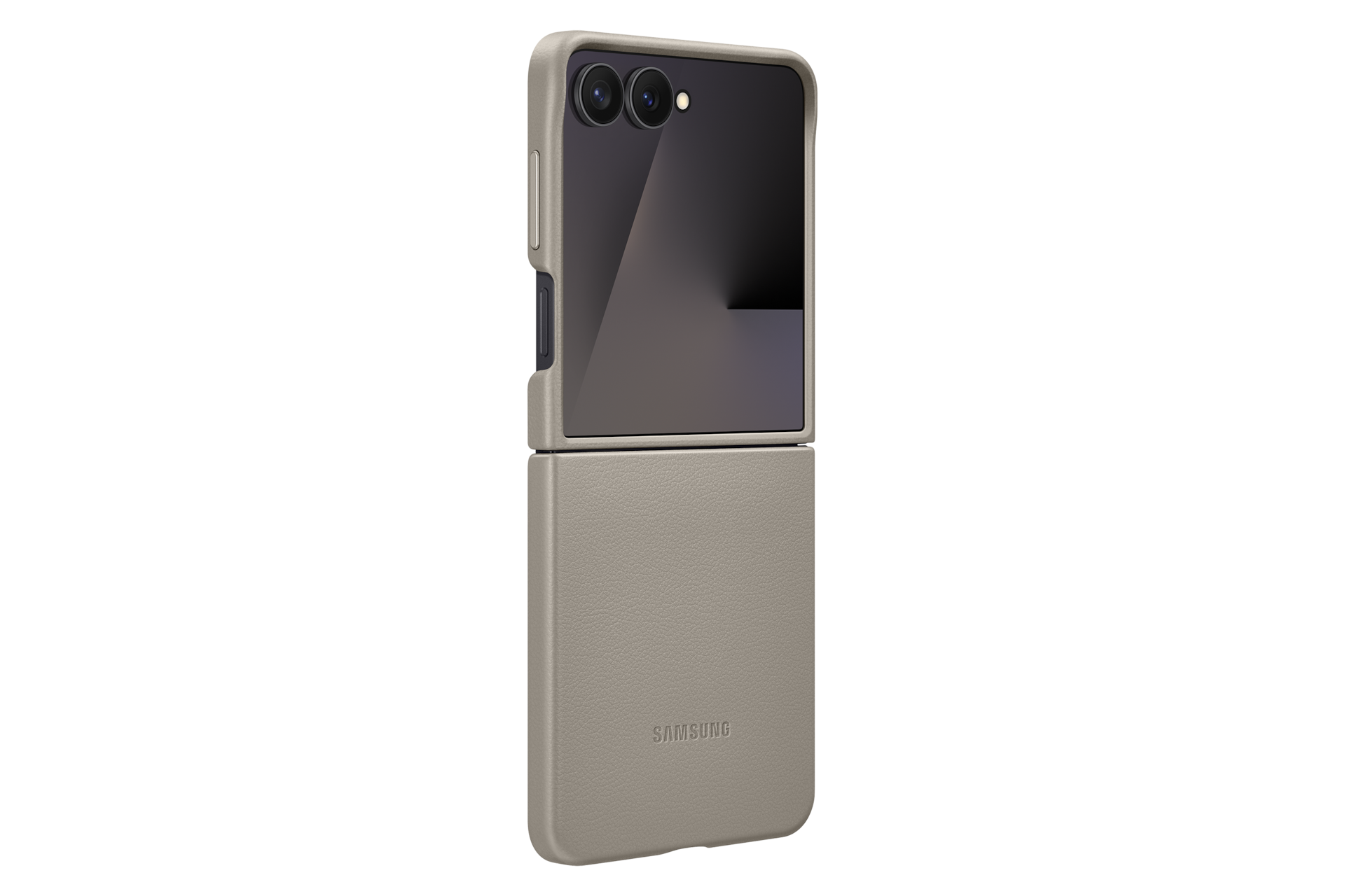 Beżowy telefon Samsung typu flip w skórzanym etui, leżący na czarnej powierzchni.