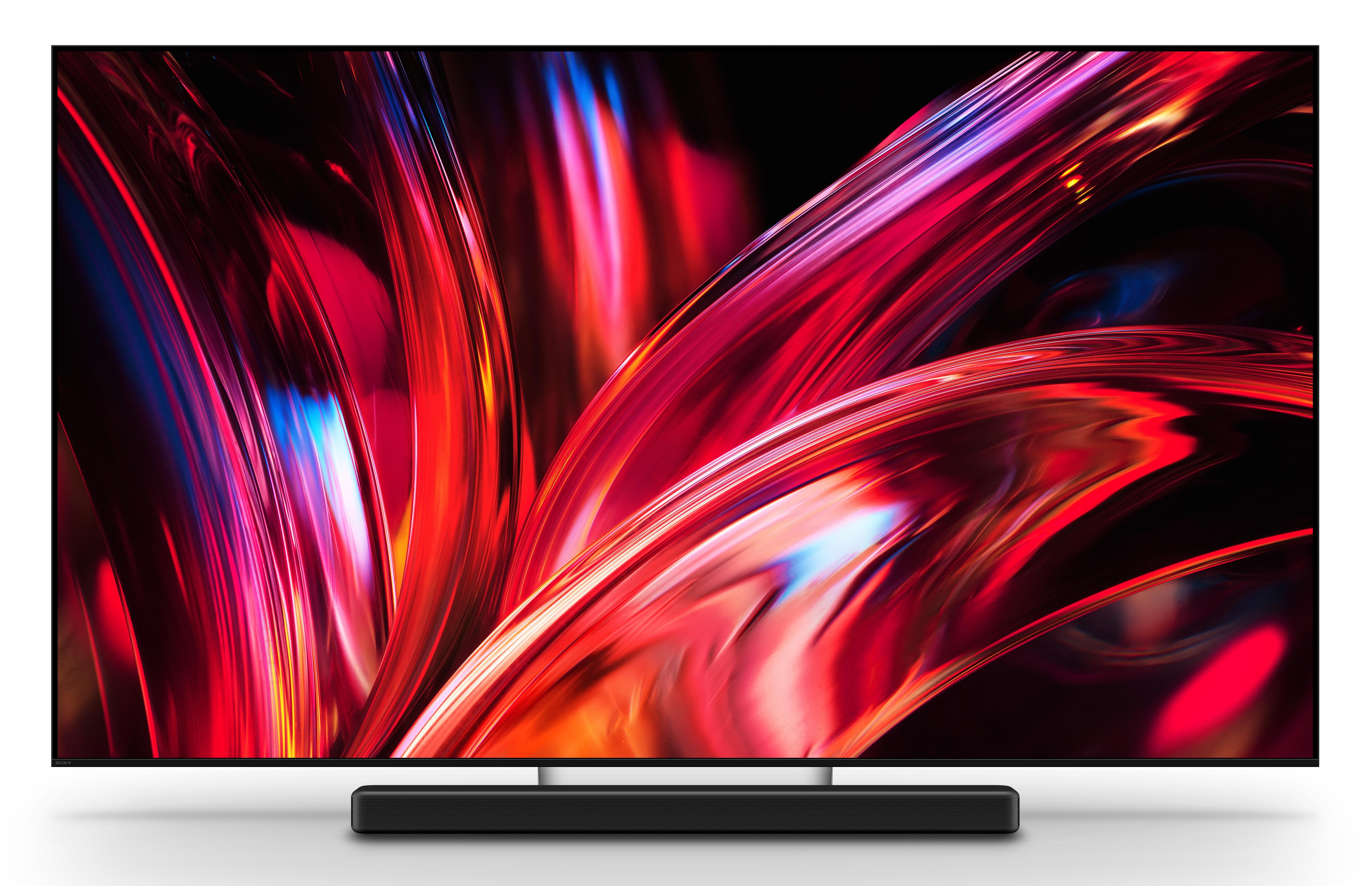 Nowoczesny telewizor z abstrakcyjnym czerwono-niebieskim wzorem na ekranie, z soundbarem.
