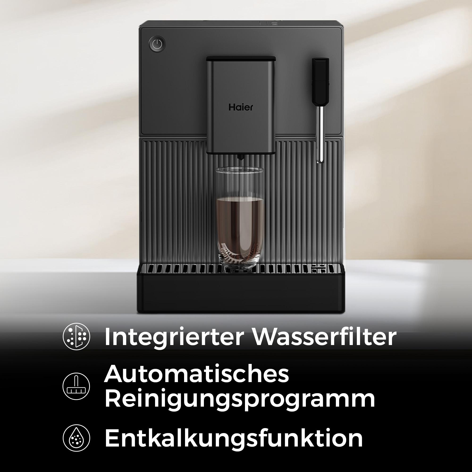 Graue Haier Kaffeemaschine mit Glas und Kaffee, integrierter Wasserfilter.