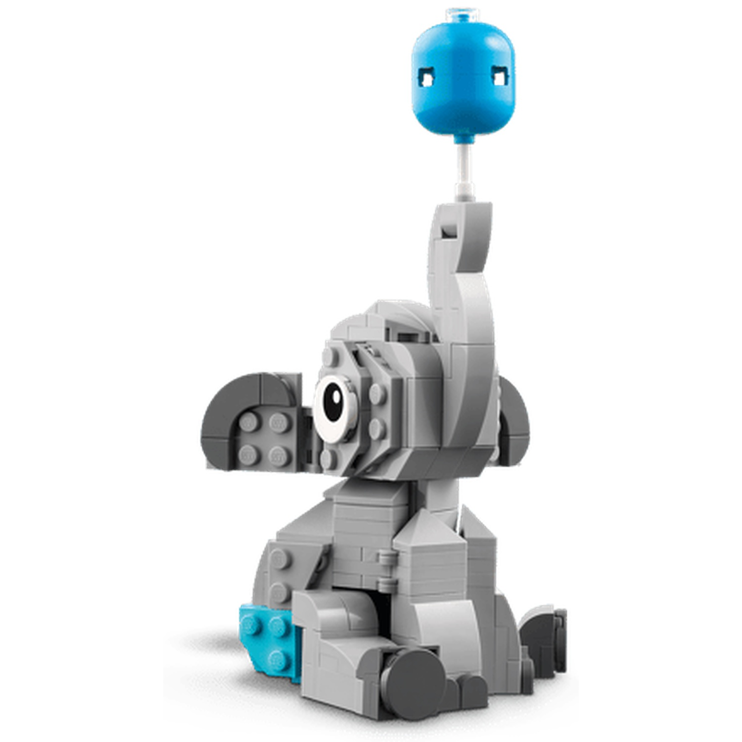 Een grijze Lego-olifant met een blauwe ballon op zijn hoofd zit.
