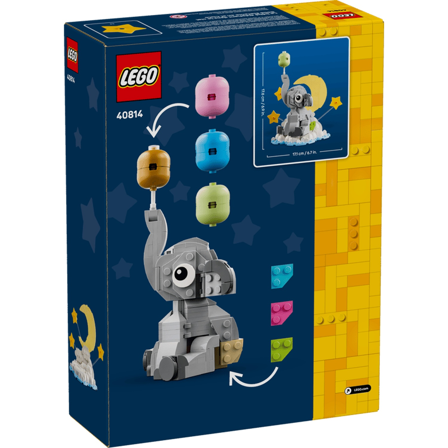 Lego-doos met grijze olifant die ballonnen vasthoudt, met maan en sterren.