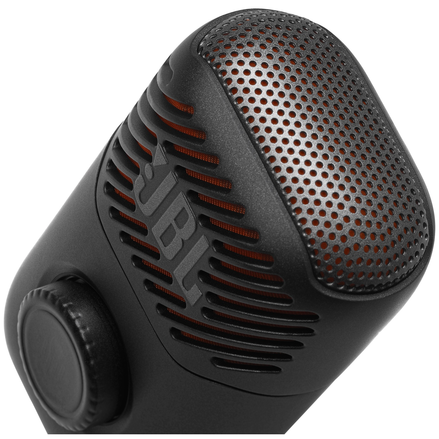 Een zwarte JBL microfoon met ronde ventilatieopeningen en een draaiknop.