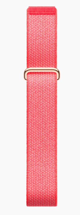 Ein rotes Textilarmband mit einem goldenen Ring, nahaufnahme.