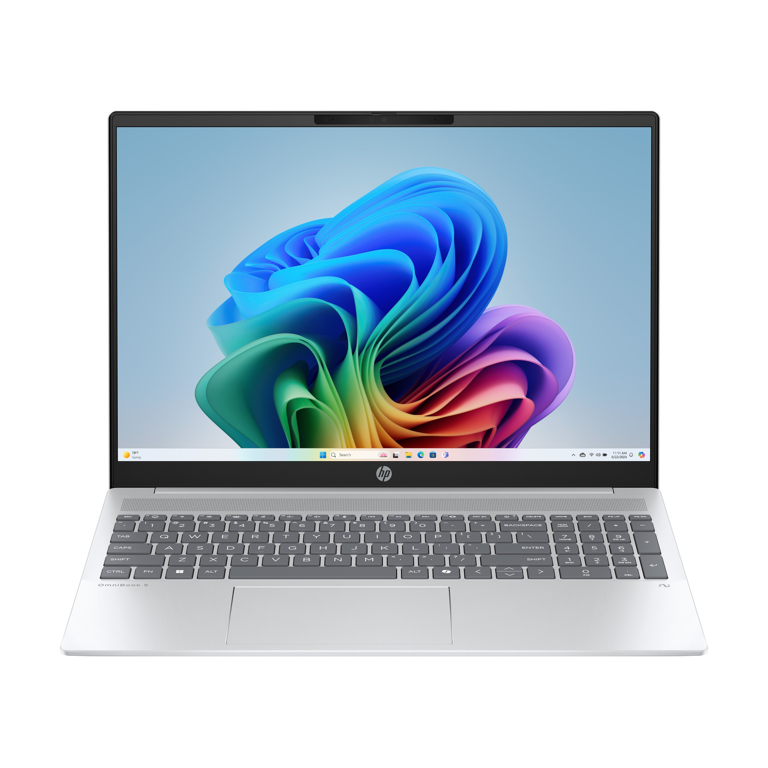 Un laptop HP argentato aperto che mostra uno sfondo colorato e una tastiera.
