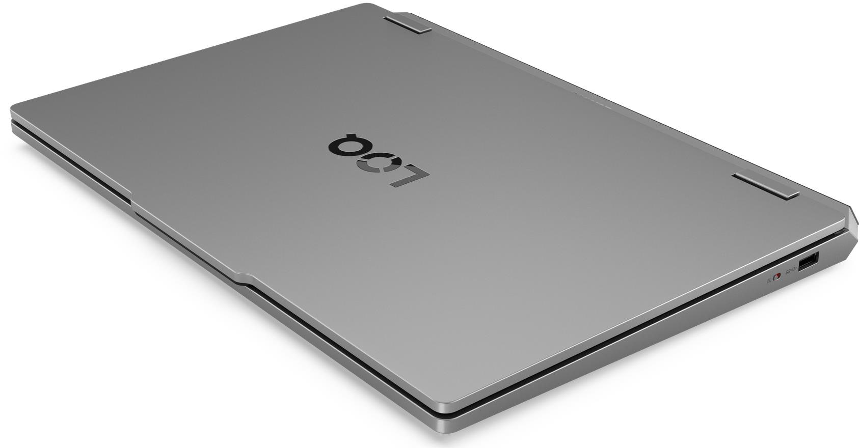 Zárt szürke laptop logóval a fedélen.
