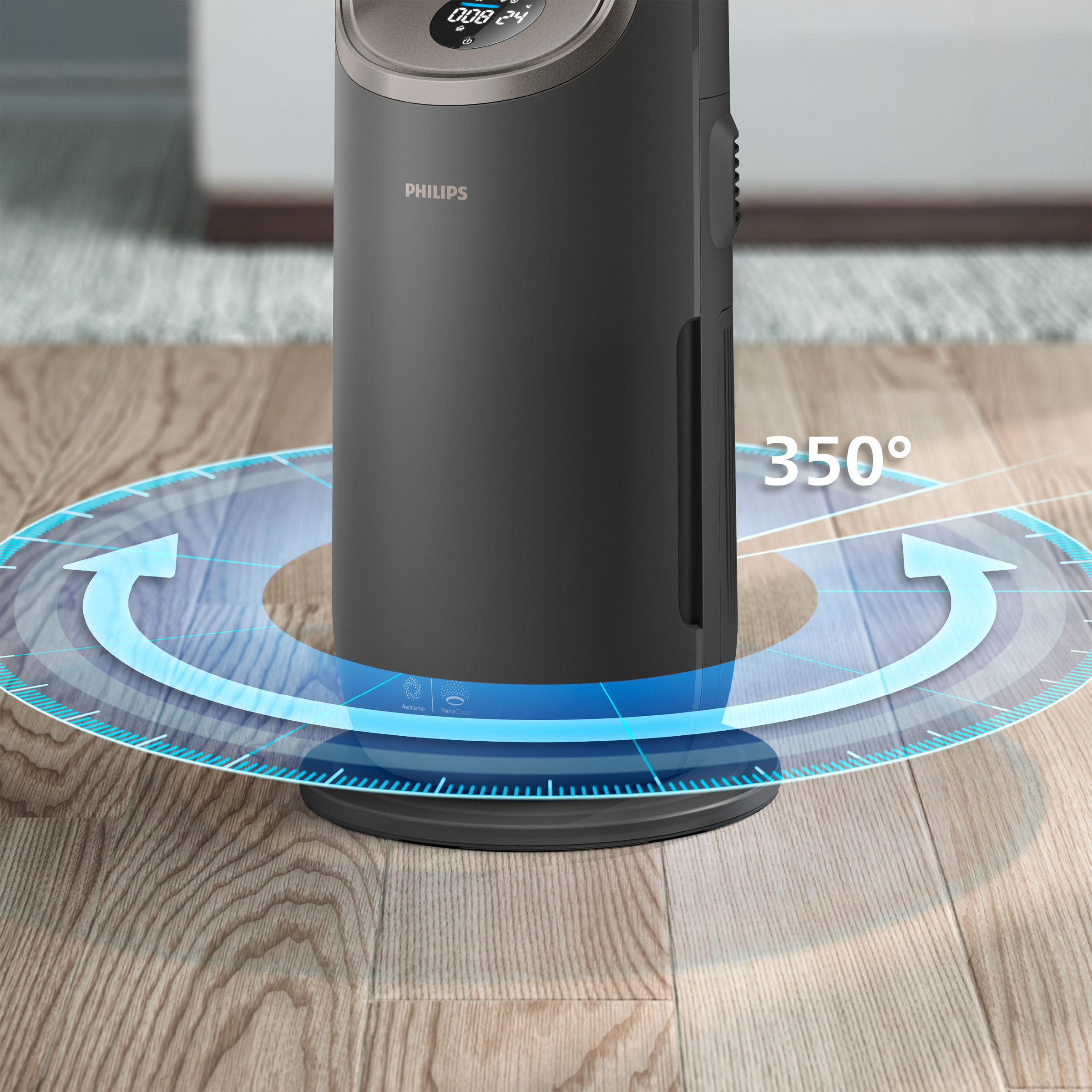 Ciemny oczyszczacz powietrza Philips na drewnianej podłodze ze wskaźnikiem obrotu o 350 stopni.