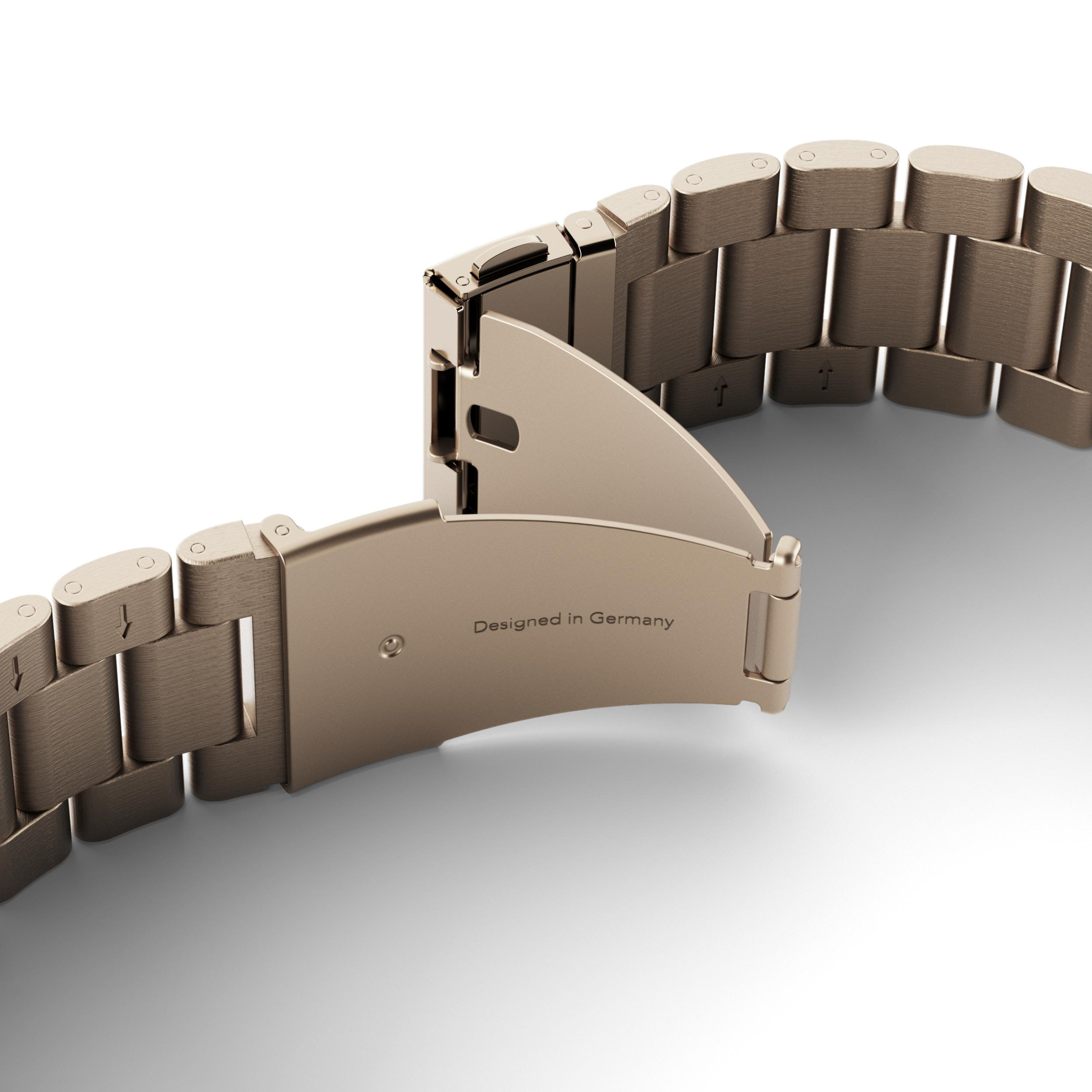 Ein silbernes Uhrenarmband mit offenem Verschluss, beschriftet mit 'Designed in Germany'.