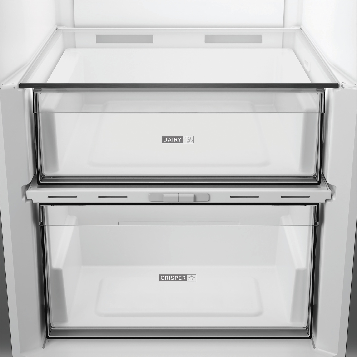Deux tiroirs transparents dans un réfrigérateur, un marqué laiterie, un marqué légume.