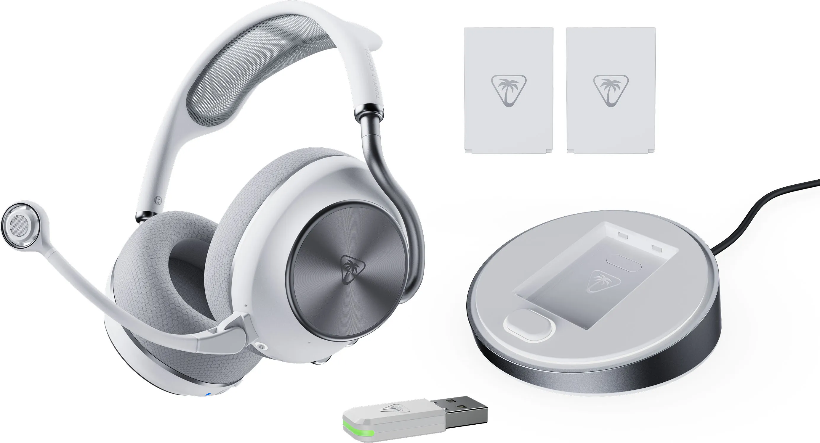 Casque blanc avec micro, station de charge, dongle USB et deux boîtes blanches.