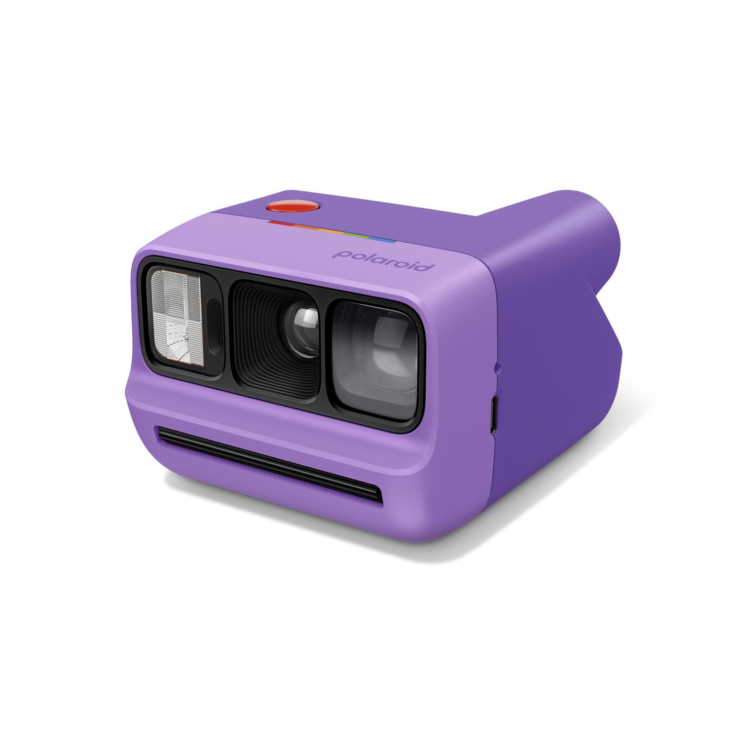 Cámara instantánea morada con botón rojo y logo Polaroid.