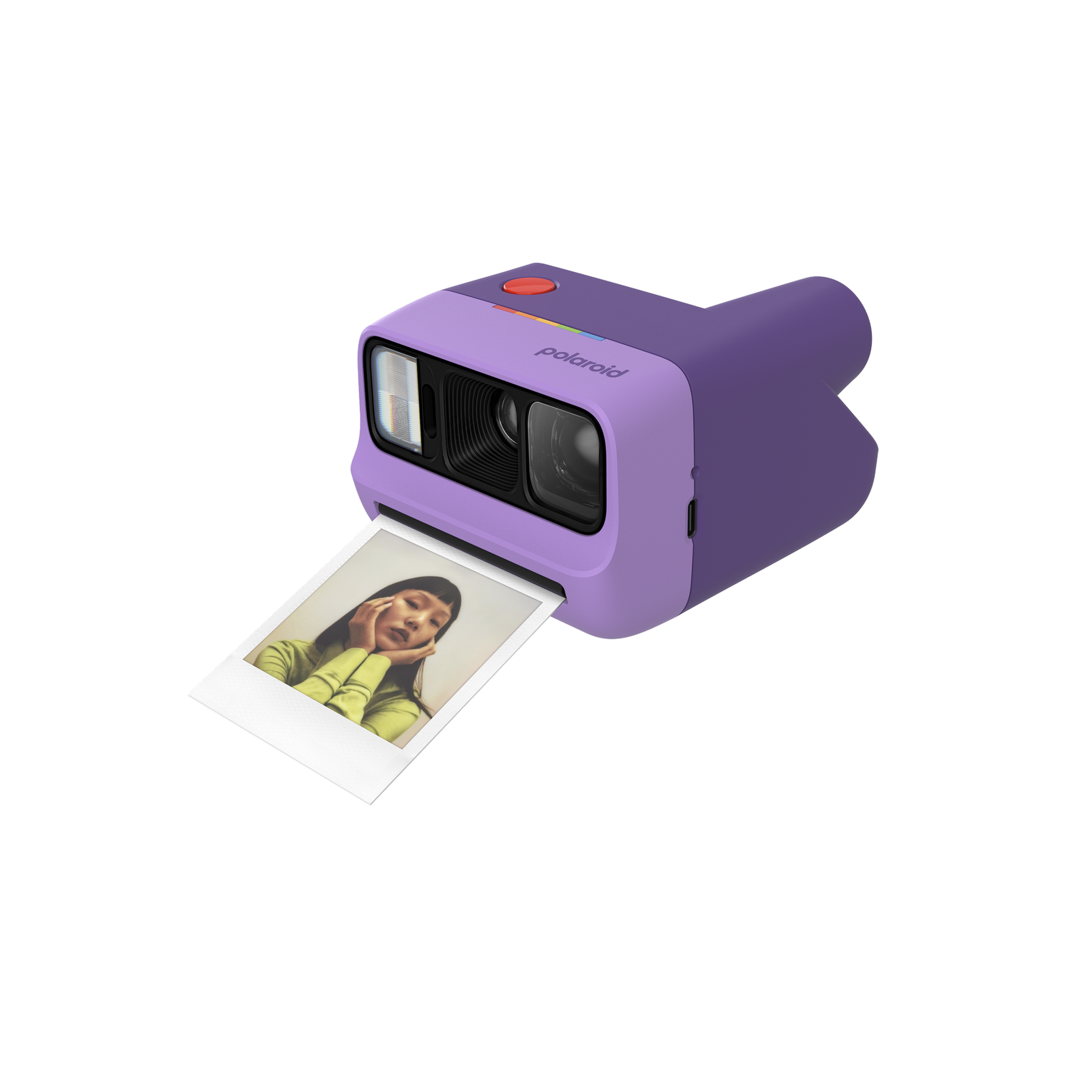 Cámara Polaroid morada con foto de mujer con top verde.