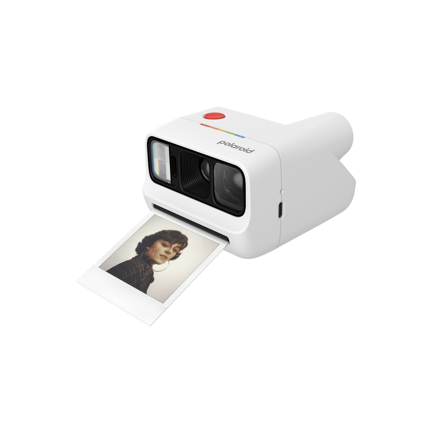 Una cámara Polaroid blanca con una foto de una mujer con aros.