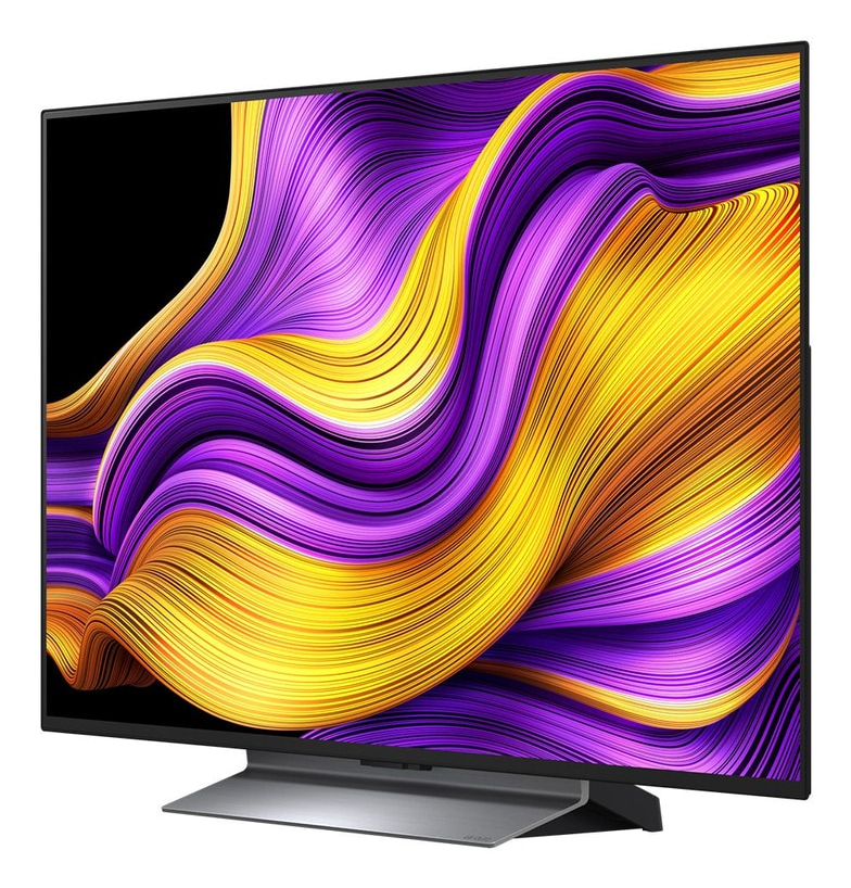 Un televisor moderno con contenido de pantalla vibrante y fluido en púrpura y amarillo.
