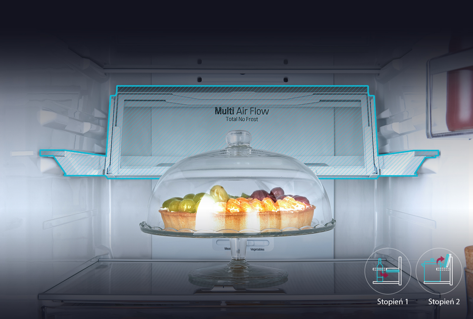 Tarta owocowa pod szklaną pokrywą w lodówce z technologią Multi Air Flow.