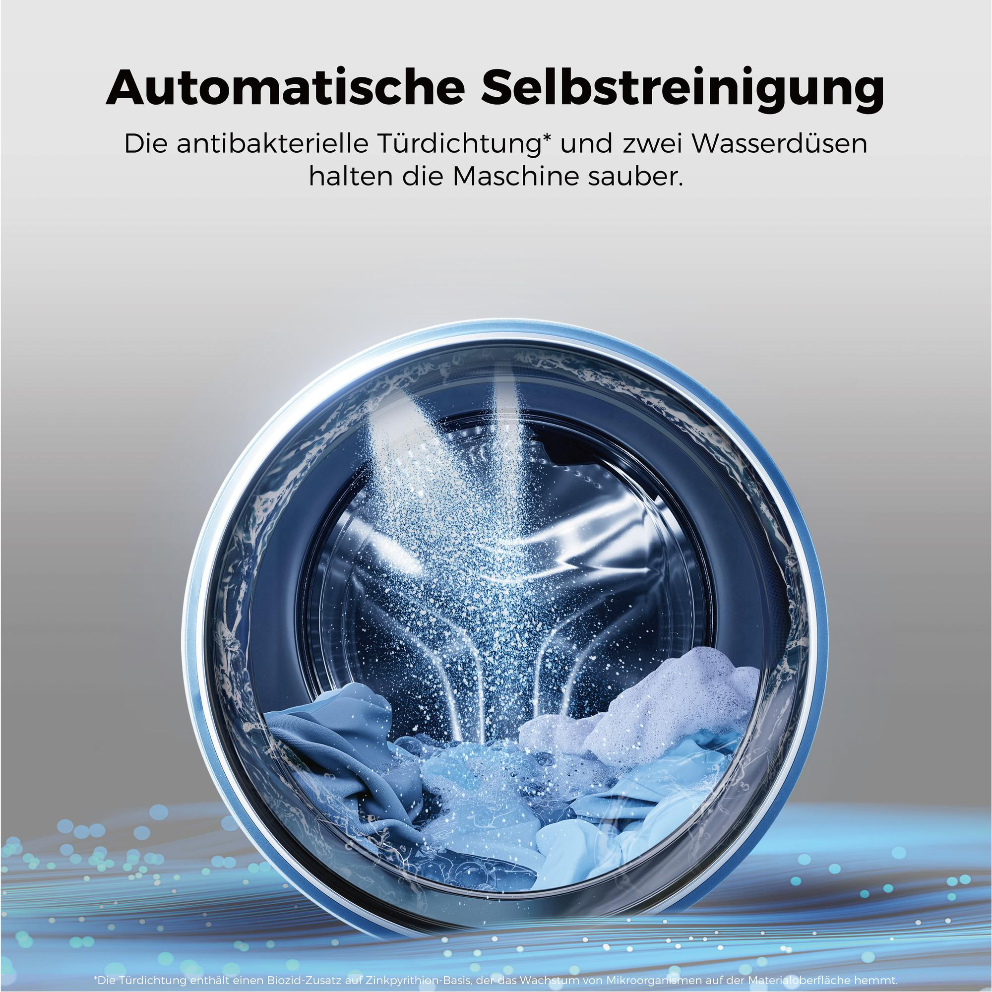Eine Waschmaschine mit blauen Textilien, die mit Wasser und Schaum gereinigt werden.