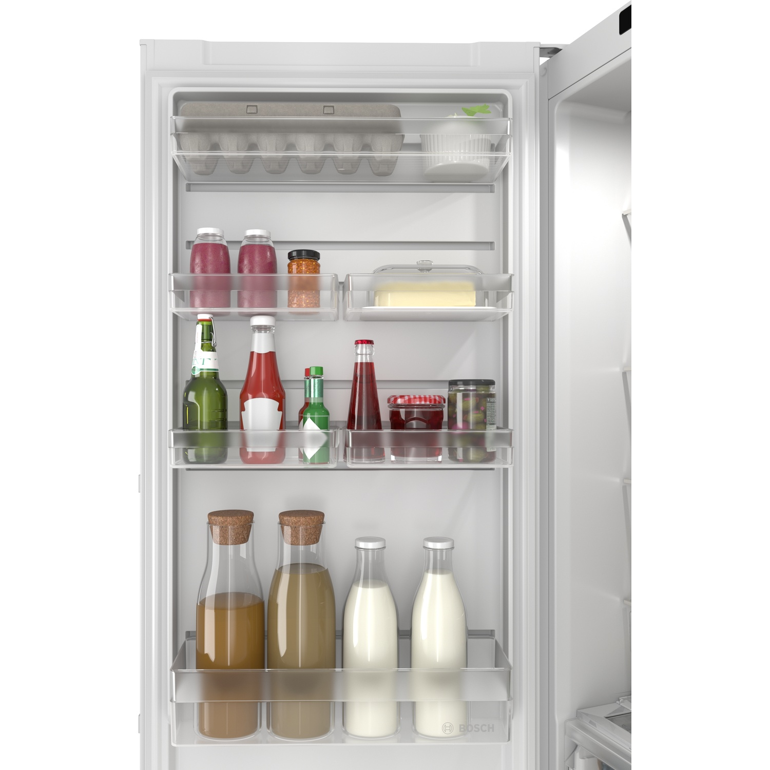 Un réfrigérateur ouvert avec des étagères remplies de nourriture et de boissons.