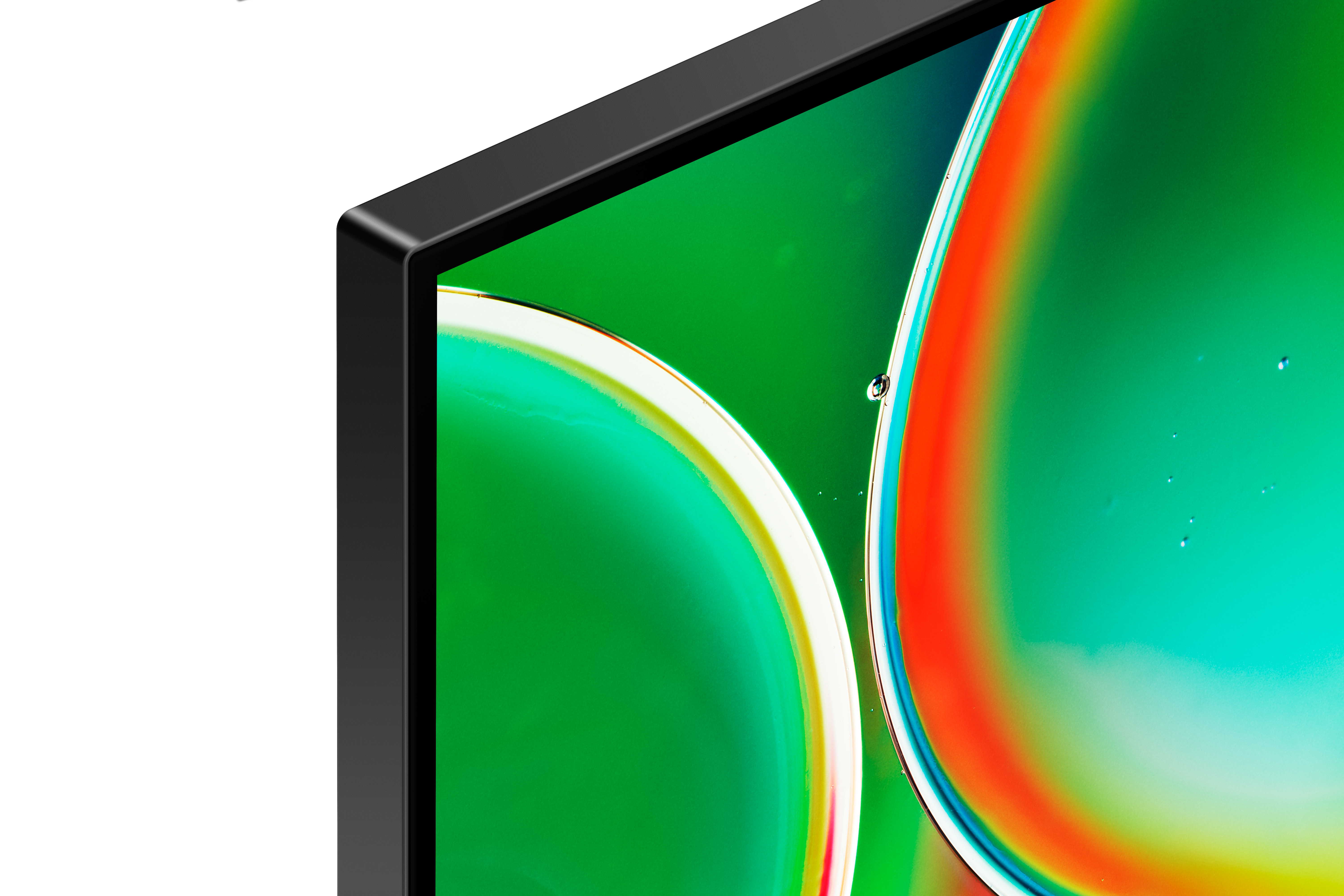 Primer plano del marco negro de un monitor con gradientes verdes y rojos.