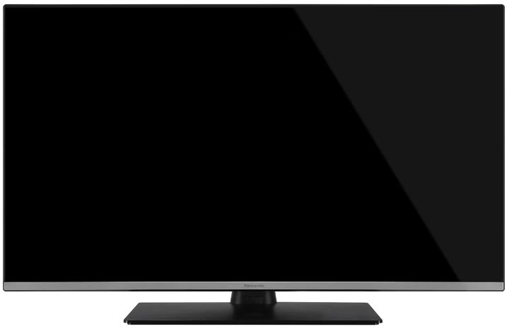 Fekete Panasonic síkképernyős televízió ezüst kerettel és fekete állvánnyal.