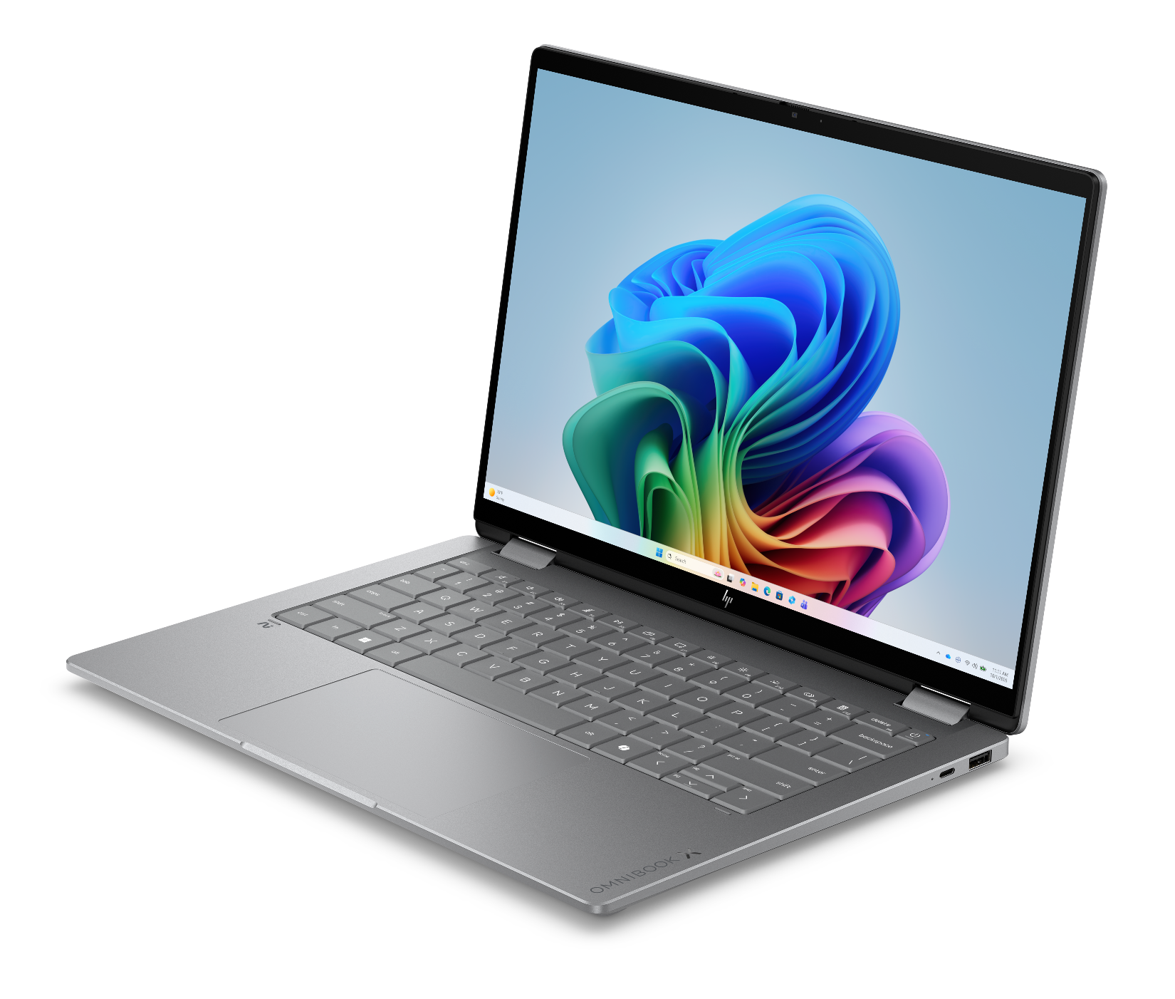 Renkli bir Windows duvar kağıdı gösteren gri bir HP OMNIBOOK dizüstü bilgisayar.