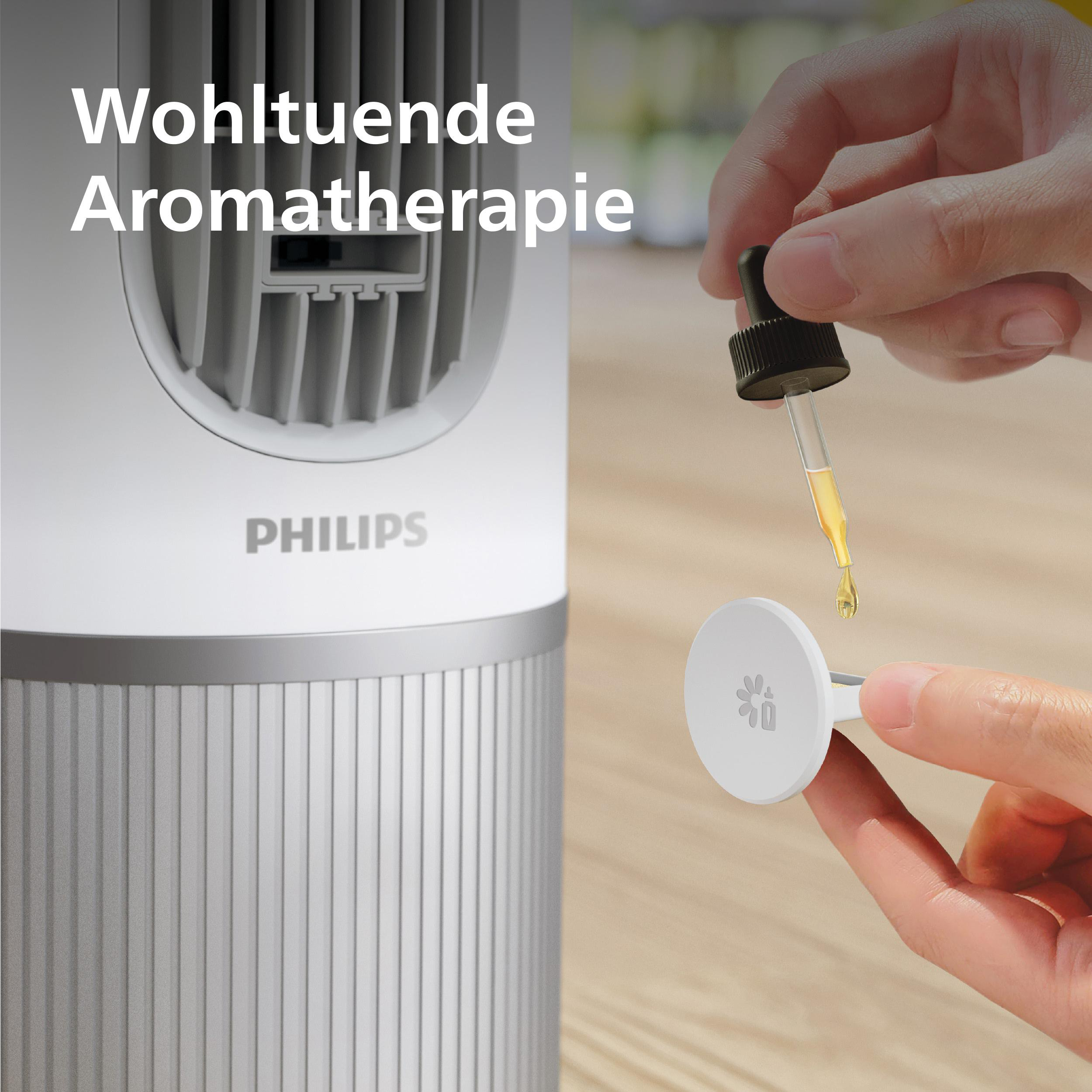 Ein Philips-Diffusor mit Tropfenöl, das auf einen Duftträger fällt.