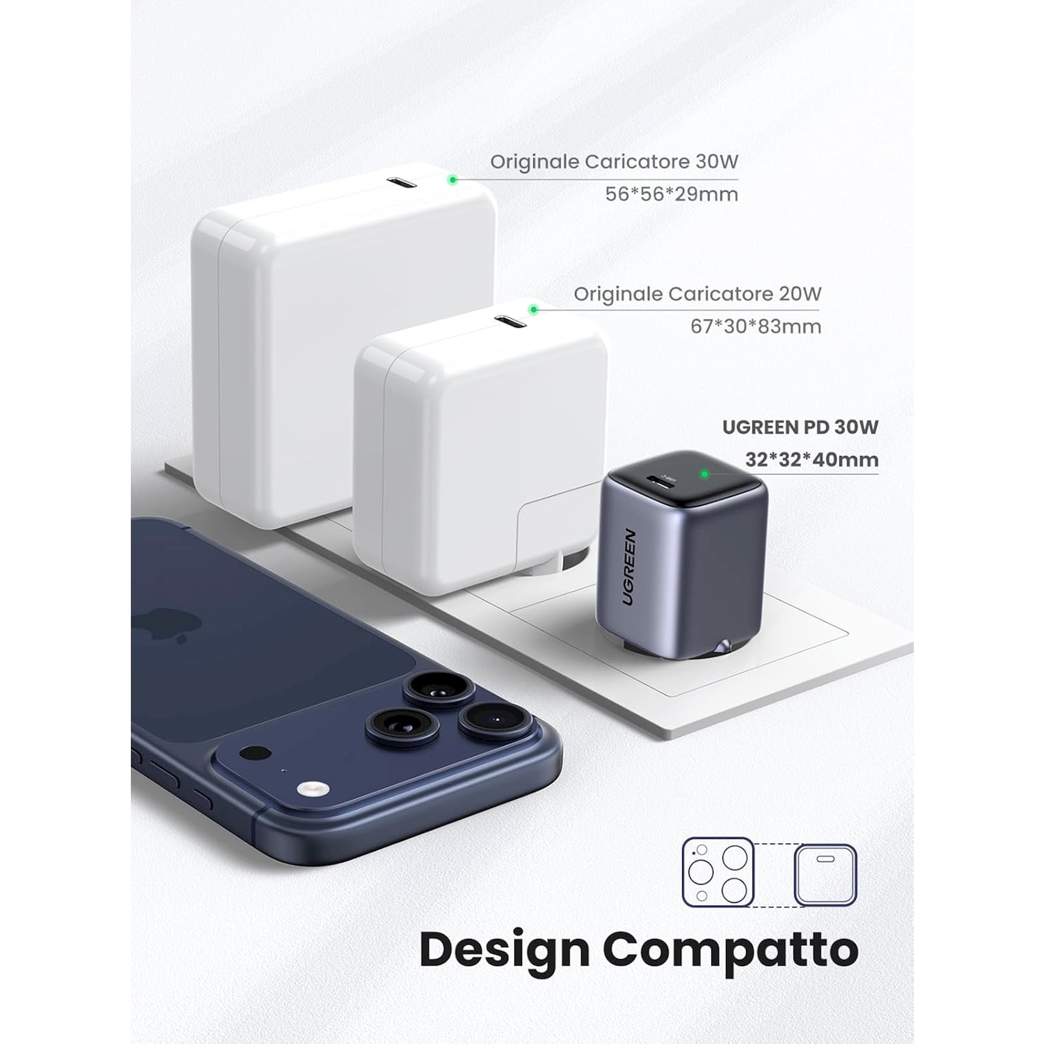 Tre caricabatterie e uno smartphone scuro giacciono su una superficie bianca.