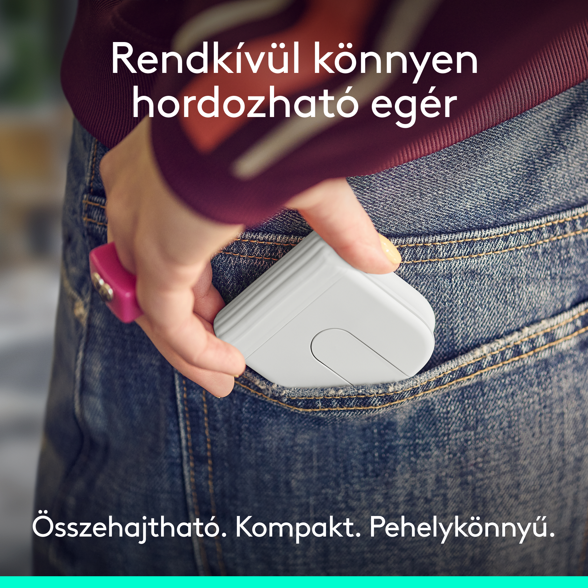 Egy kéz fehér, összecsukható egeret tesz farmer zsebbe.