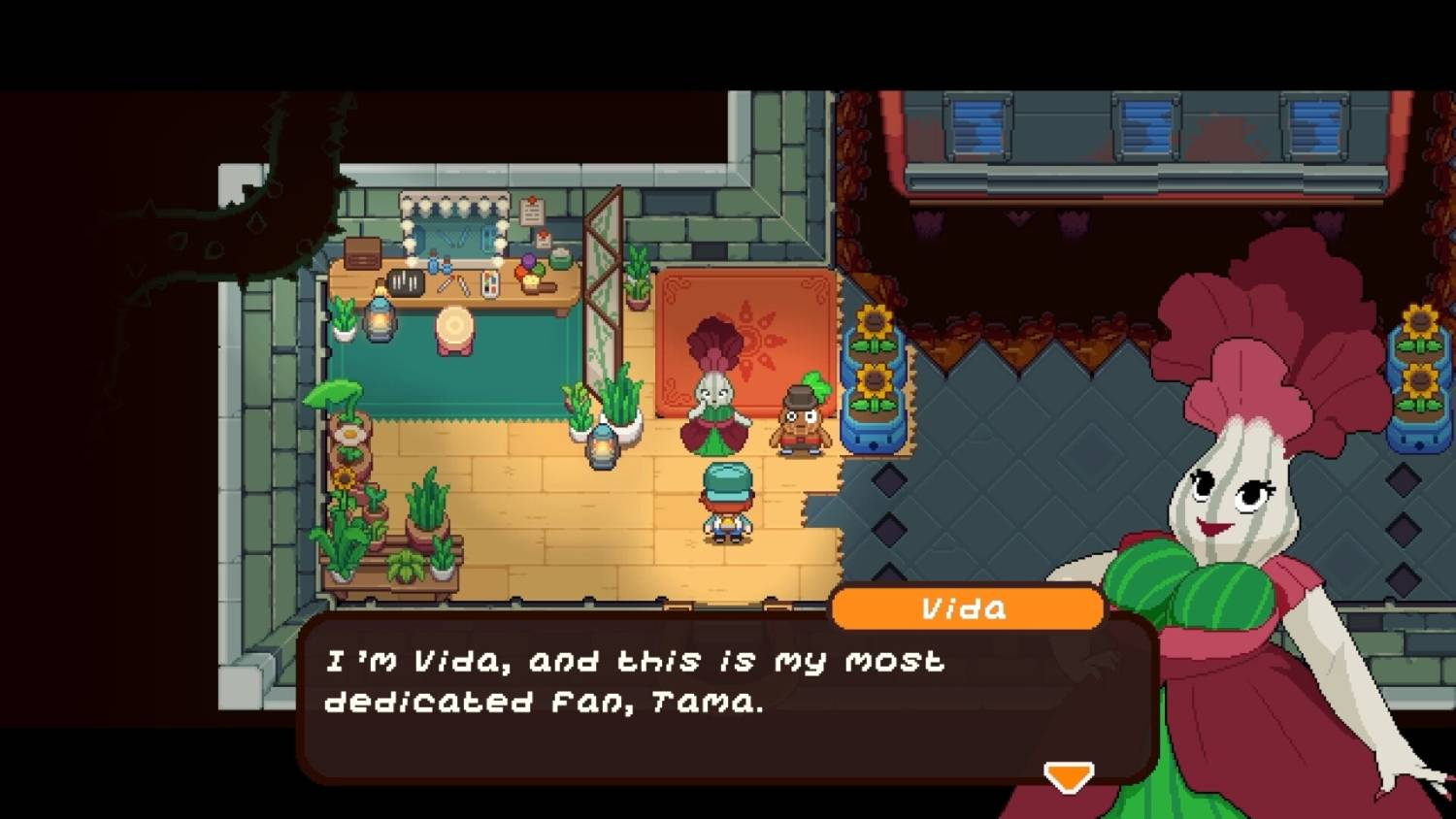Vida y su fan Tama están en una habitación con plantas y muebles.