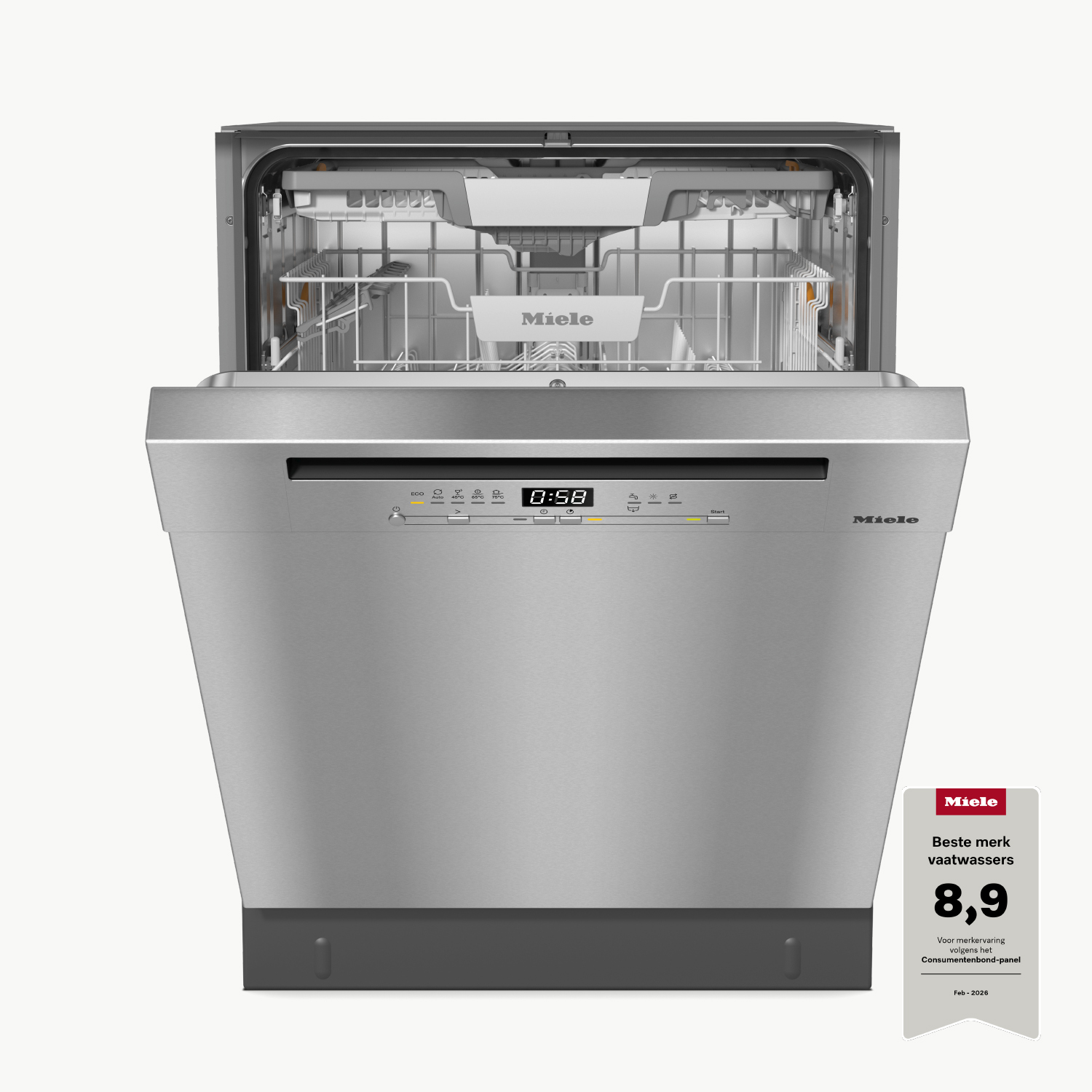 A Miele dishwasher with its door open, showing the control panel and interior.
