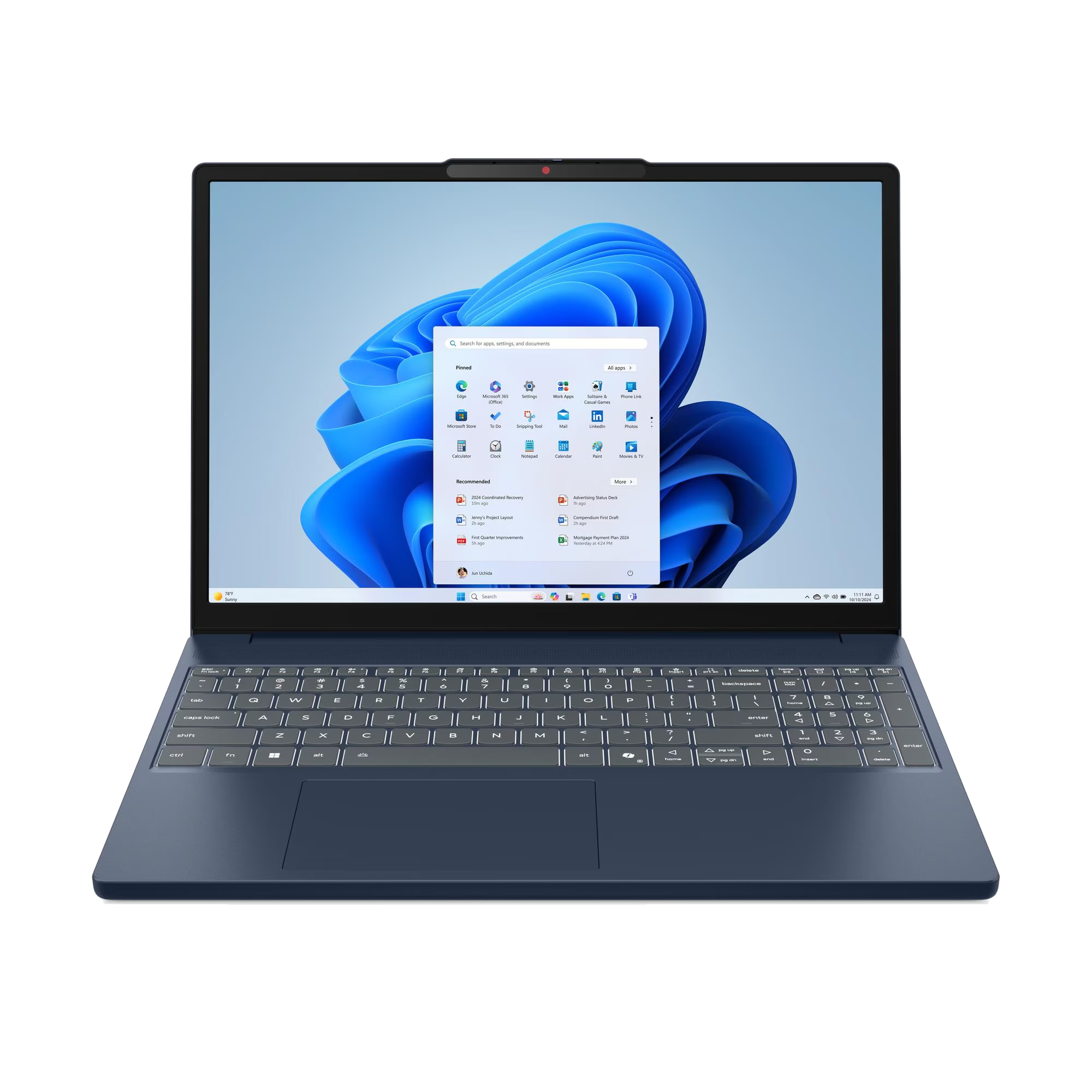Un portátil azul oscuro muestra el menú de inicio de Windows 11 con un fondo de olas azules.