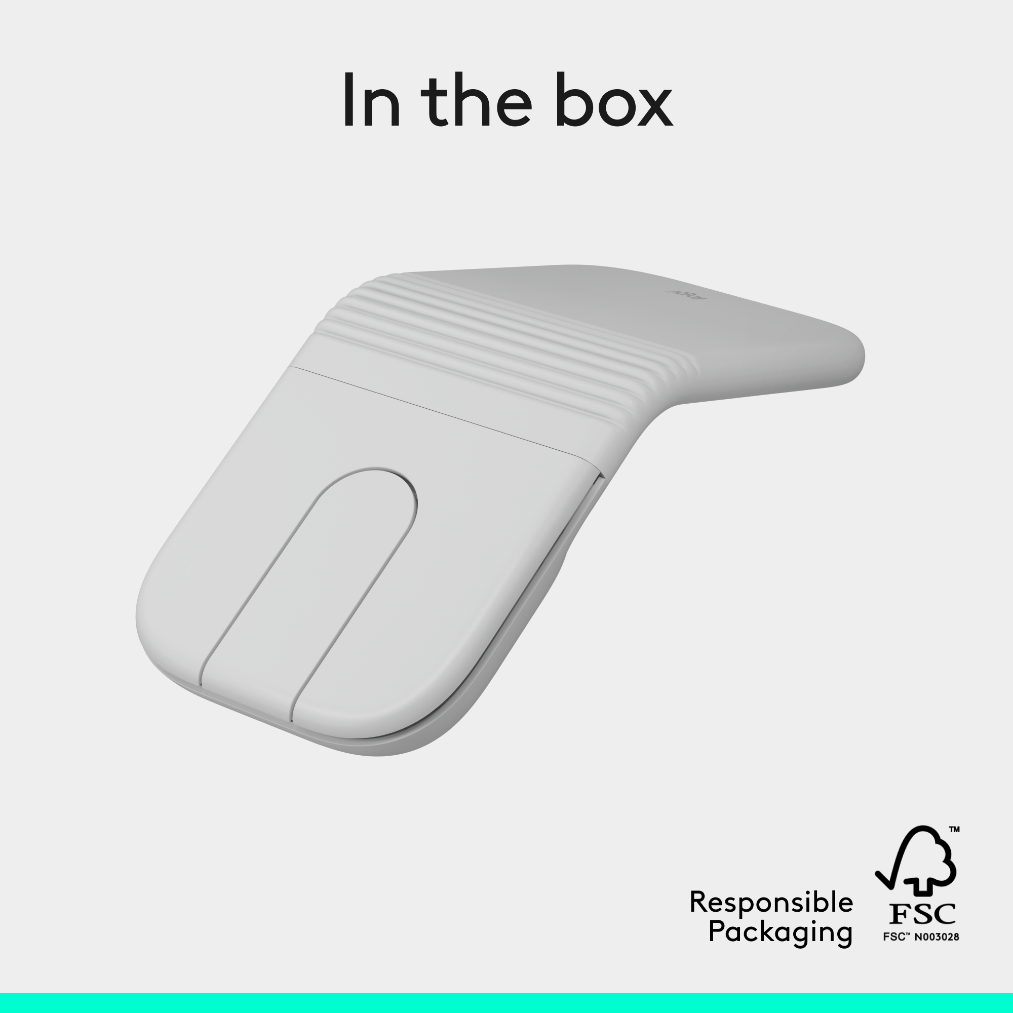 Un clicker grigio con scanalature e un cerchio blu. Testo: In the box.