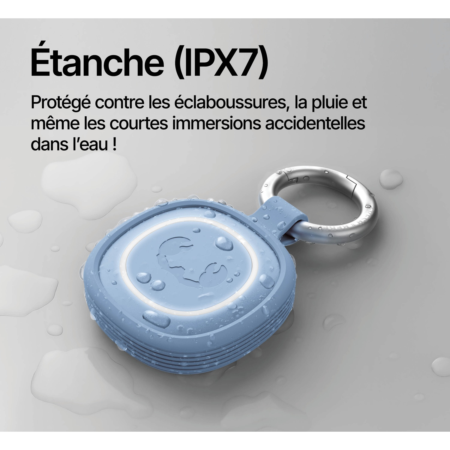 Un appareil bleu et étanche avec un anneau en métal sur une surface humide.