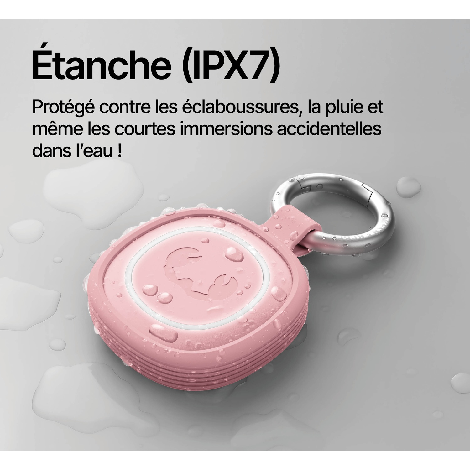 Un appareil rose et étanche avec un fermoir métallique et des gouttes d'eau.