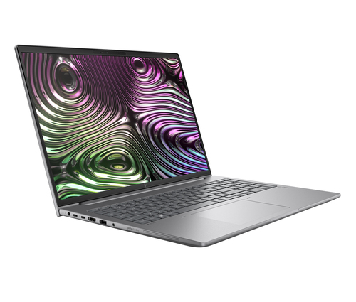 Un portátil plateado con un patrón orgánico colorido en la pantalla.