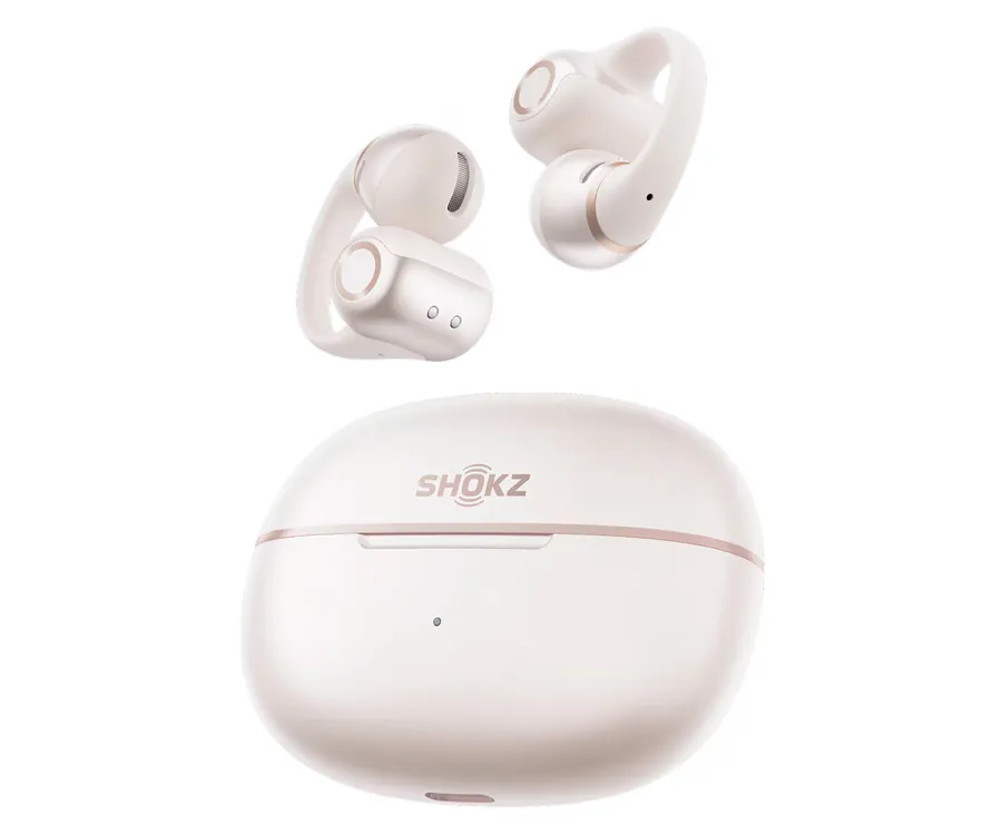 Auriculares Shokz blancos y estuche de carga, con ribete oro rosa.