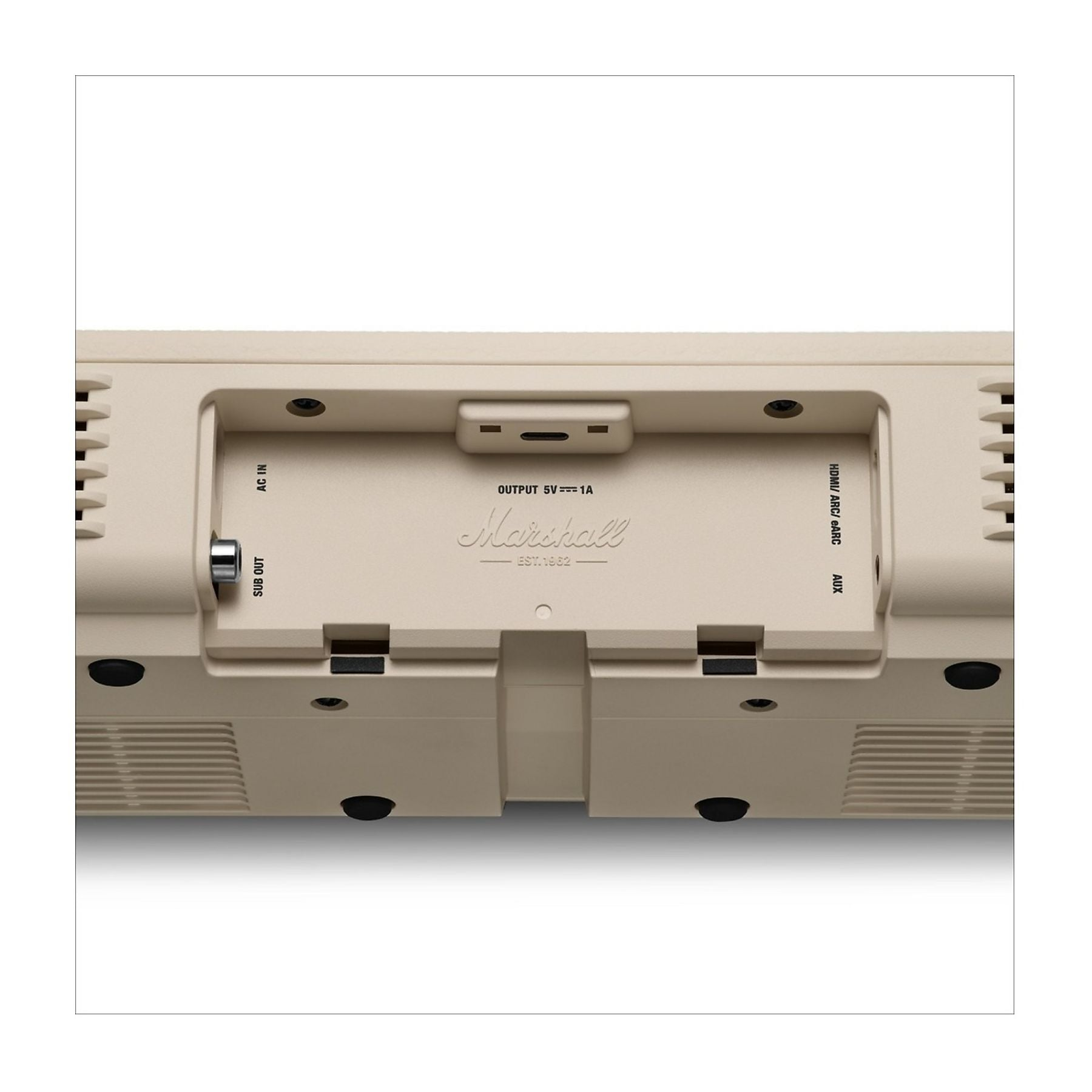 Vista trasera de un dispositivo beige con puertos SUB OUT, AC IN, HDMI/ARC/eARC y AUX.