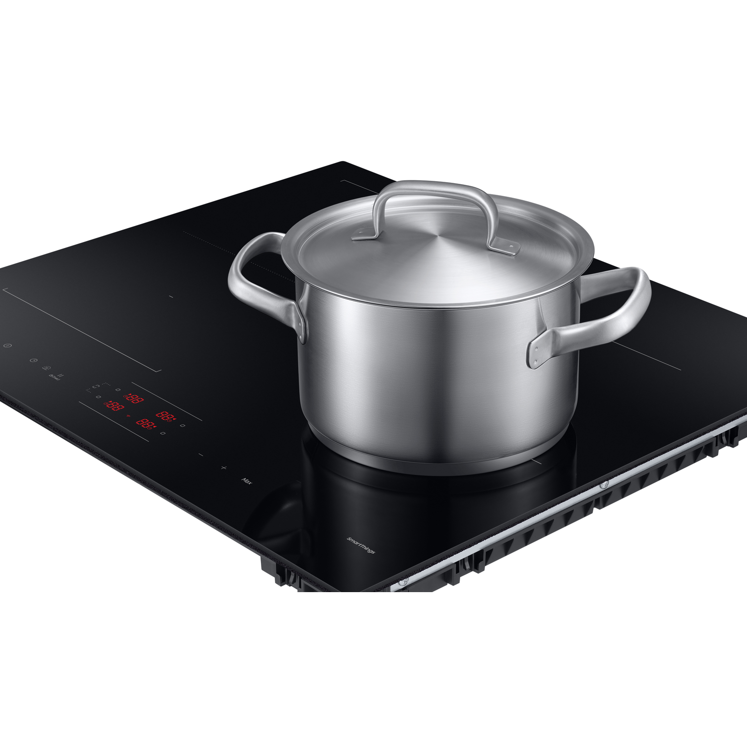 A silver pot sits on a black induction cooktop with red digital displays.