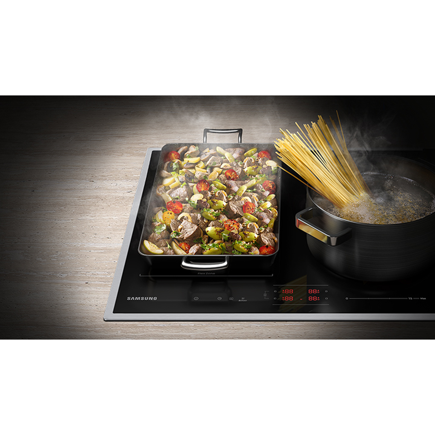 Meat and vegetables in a pan, spaghetti cooking in a pot on an induction hob.