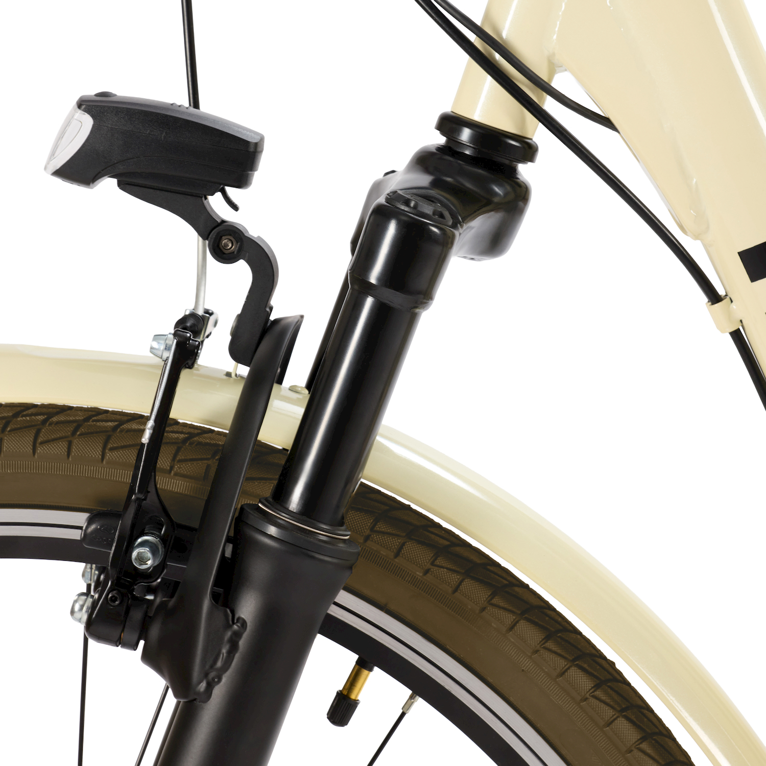 Primo piano della parte anteriore di una bicicletta color crema con forcella ammortizzata nera e luce.