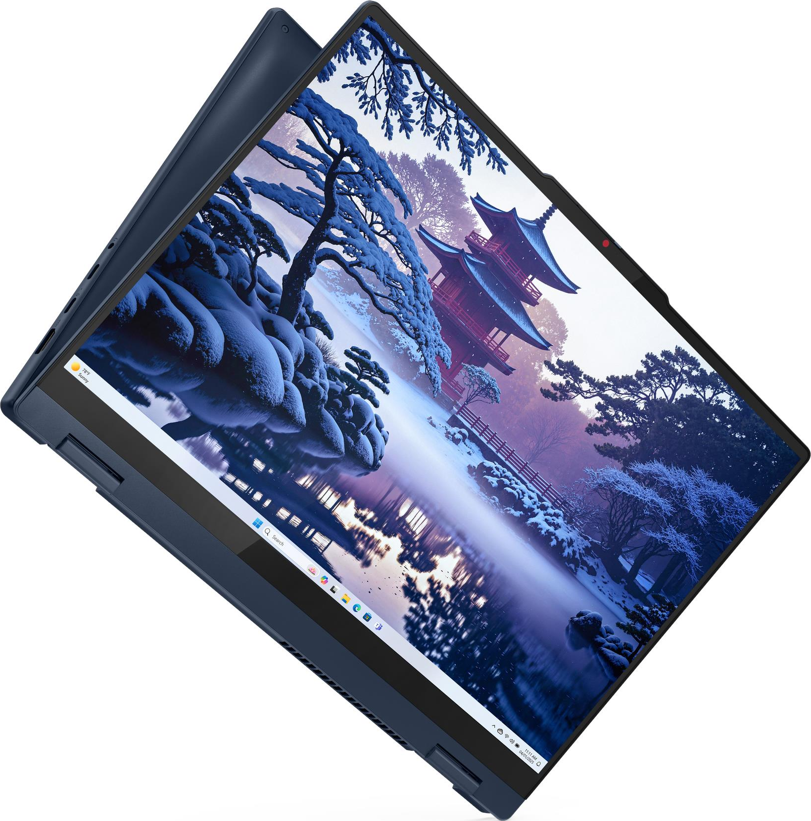 Ein dunkelblauer Laptop zeigt einen Desktop mit einer Winterlandschaft und Pagoden.