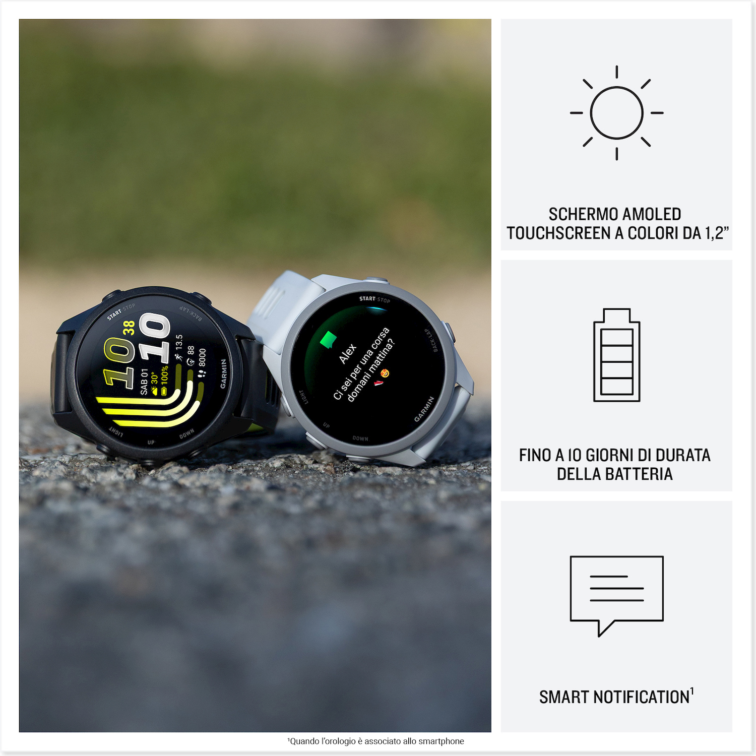 Due smartwatch Garmin su pietre. Una mostra ora e dati allenamento, l'altra un messaggio.