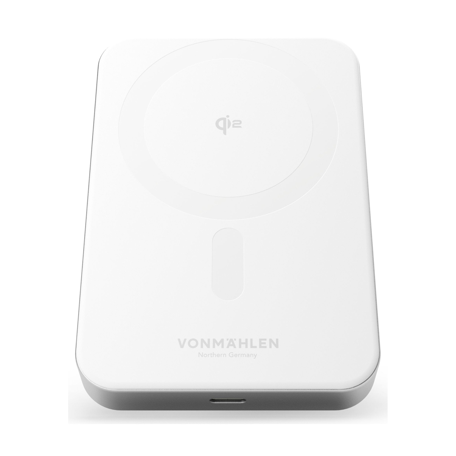 Un caricatore wireless bianco con logo "qi" e testo "VONMÄHLEN".