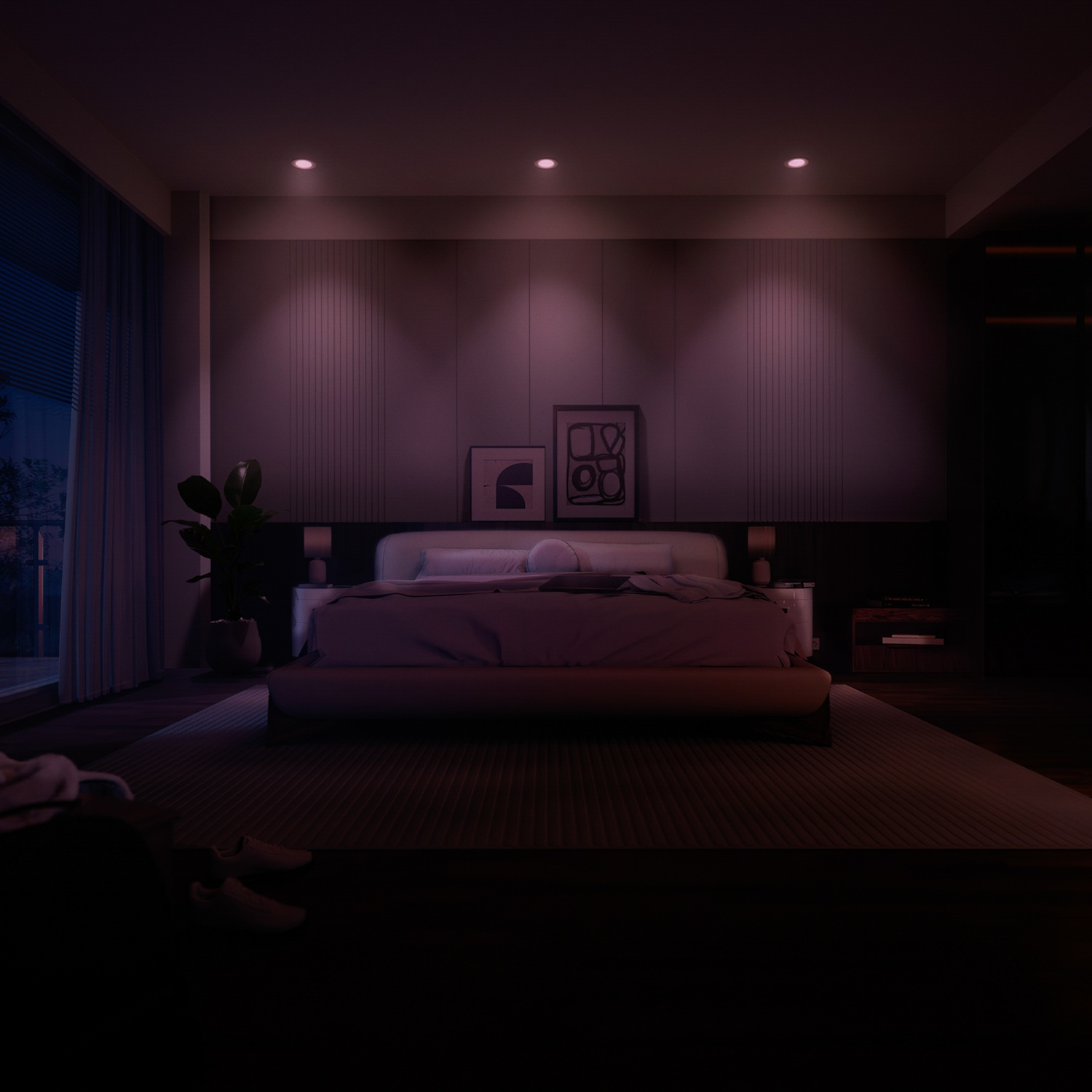 Une chambre avec un grand lit et un éclairage violet.