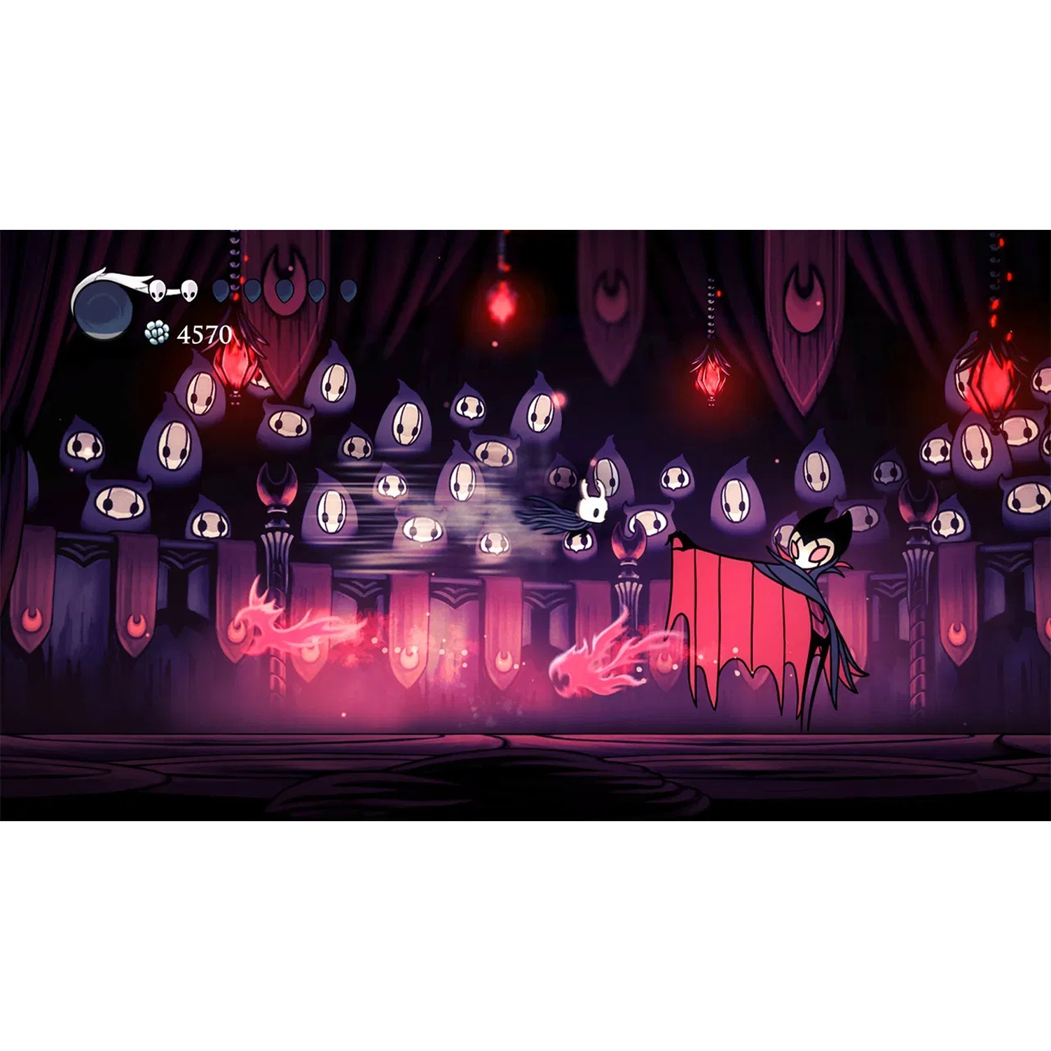 A character in a red cloak fights pink ghosts before many spectators.