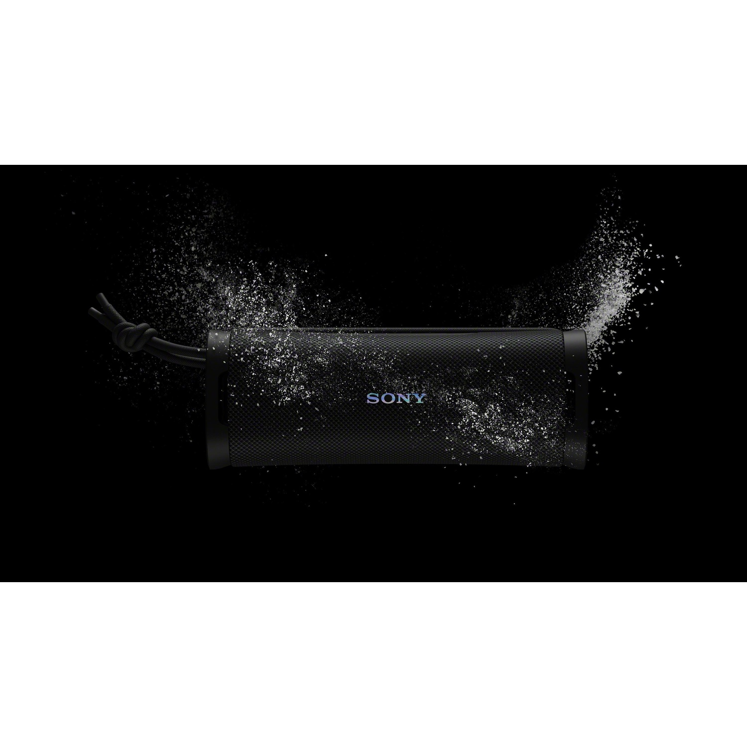 Altoparlante Sony nero con laccetto e schizzi d'acqua su sfondo nero.