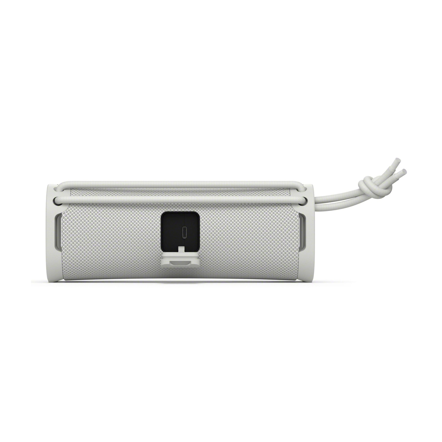 Un altoparlante Bluetooth bianco con porta nera e cavo.