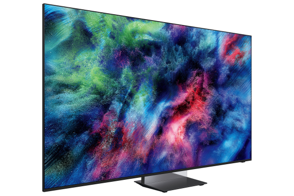 Patlayan renklerle soyut, renkli bir ekran koruyucu gösteren modern bir TV.