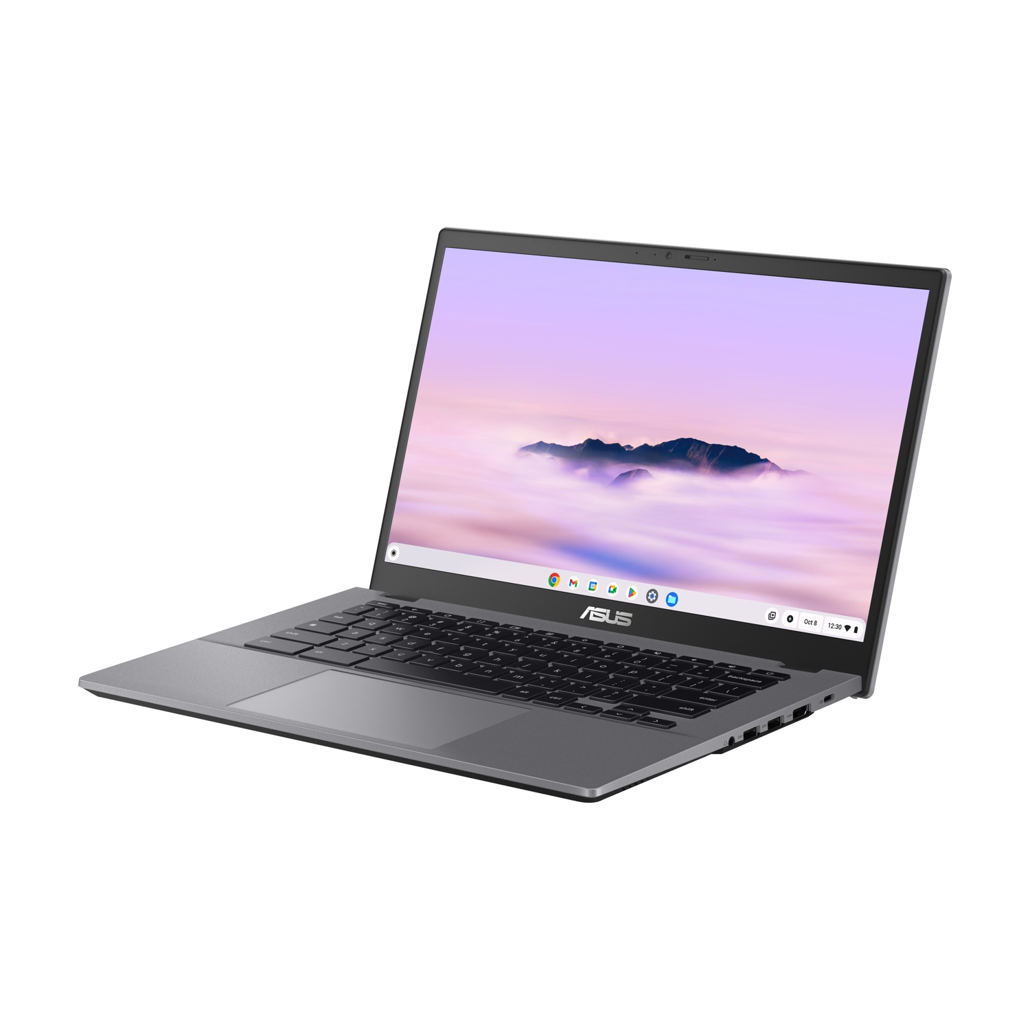 Un laptop grigio aperto mostra un panorama montano sul suo schermo.