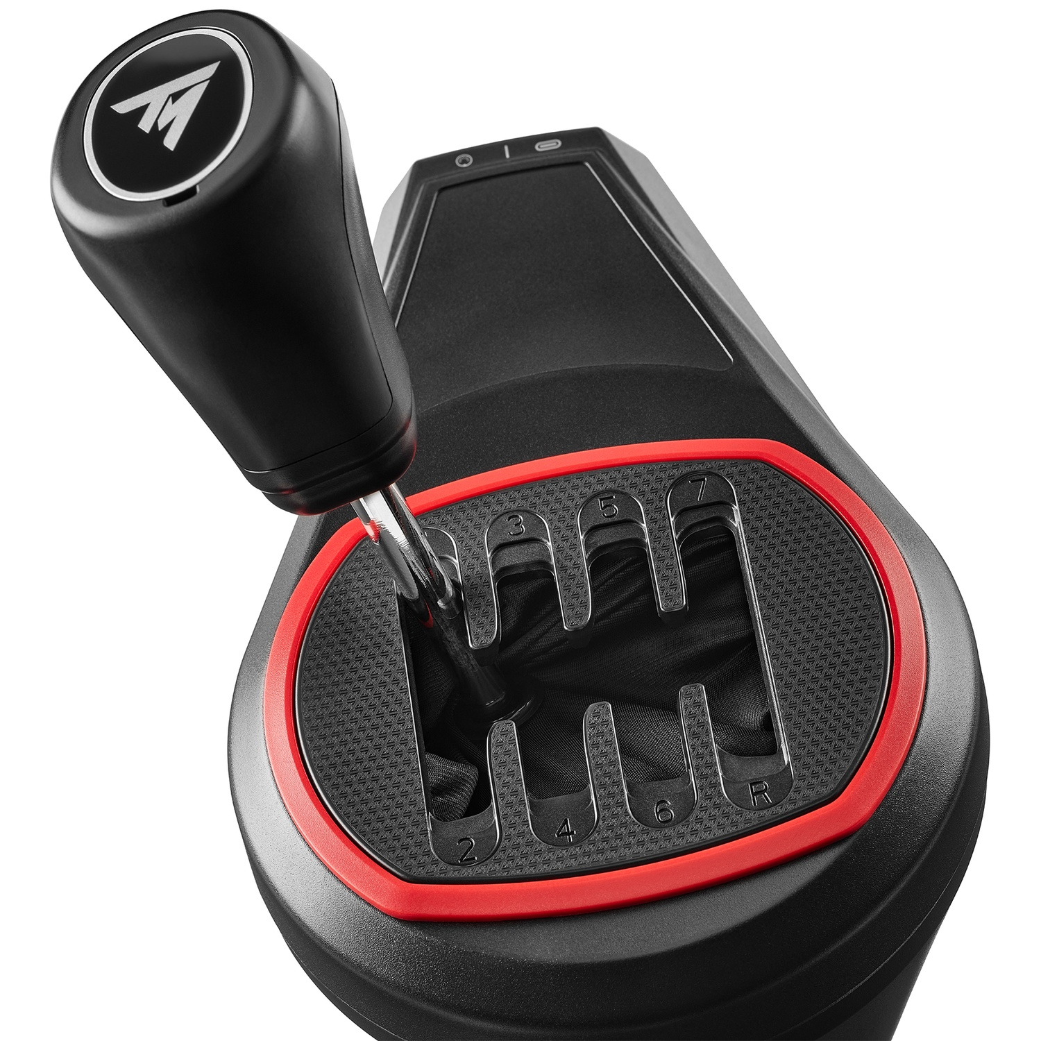 A black gear shifter with a red trim and numbered pattern.